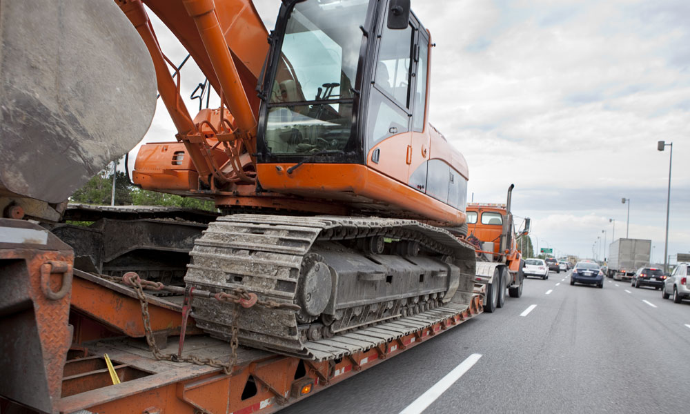 Heavy Equipment Transportation: Tips for Moving Your Large Machinery Safely